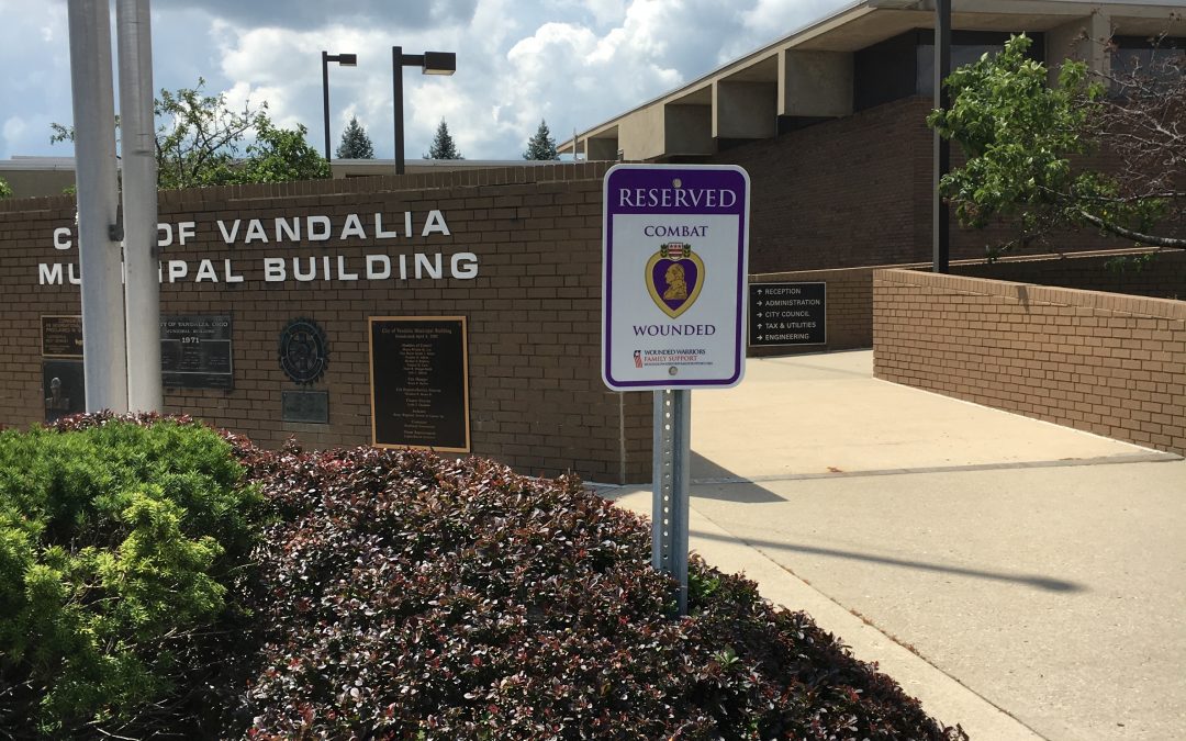 Combat Reserved parking in place at three City buildings