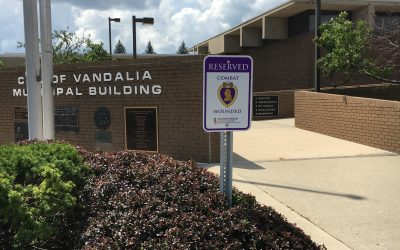 Combat Reserved parking in place at three City buildings